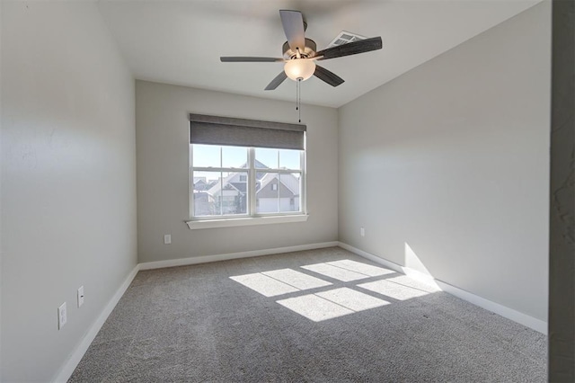 carpeted empty room with ceiling fan