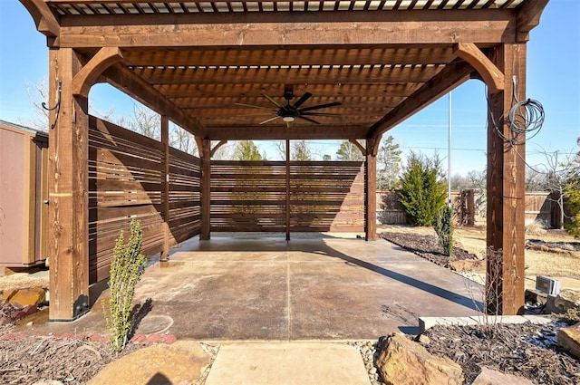 view of patio featuring ceiling fan and a pergola