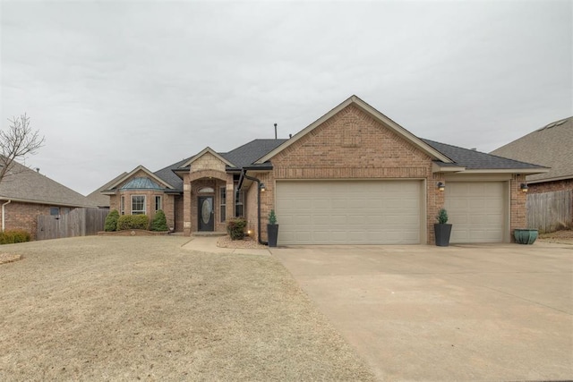 ranch-style house featuring a garage