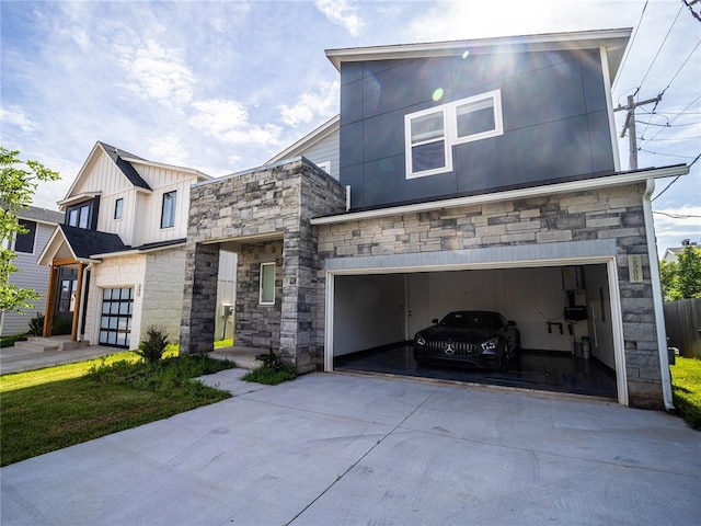 view of front of property with a garage