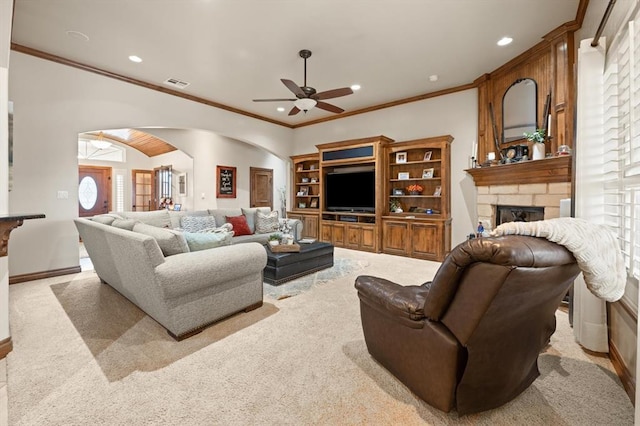 329826 E Hwy 66, Wellston, OK 74881 - living area with a ceiling fan, a stone fireplace, carpet, crown molding, and recessed lighting