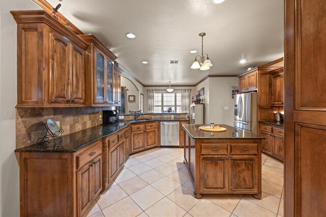 329826 E Hwy 66, Wellston, OK 74881 - kitchen featuring appliances with stainless steel finishes, a sink, a peninsula, tasteful backsplash, and recessed lighting