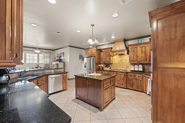 329826 E Hwy 66, Wellston, OK 74881 - kitchen with custom range hood, stainless steel appliances, a sink, ornamental molding, and decorative backsplash