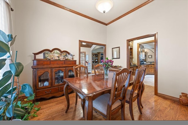 329826 E Hwy 66, Wellston, OK 74881 - dining area featuring ornamental molding, light wood-style flooring, and baseboards