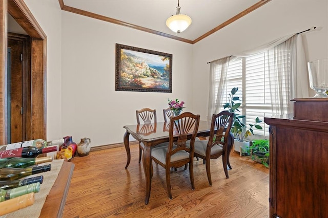 329826 E Hwy 66, Wellston, OK 74881 - dining area with crown molding, wood finished floors, and baseboards