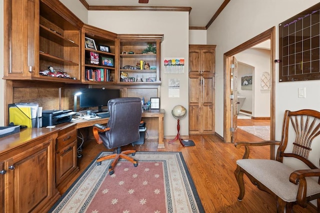 329826 E Hwy 66, Wellston, OK 74881 - home office featuring built in study area, light wood-style floors, and crown molding