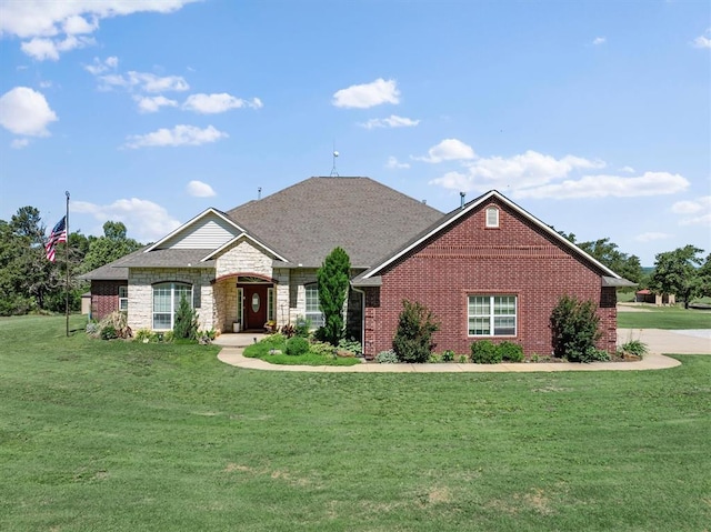 329826 E Hwy 66, Wellston, OK 74881 - view of front of home featuring a front yard, stone siding, and brick siding