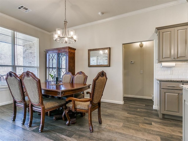 3683 King Arthur Ct, Newcastle, OK 73065 - dining room with a chandelier, dark wood-style floors, baseboards, and crown molding