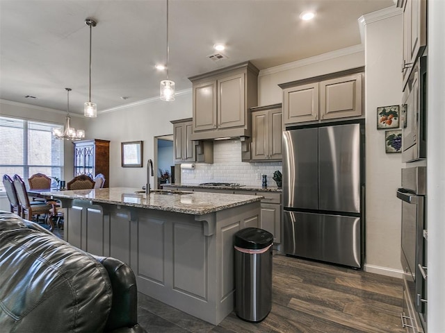3683 King Arthur Ct, Newcastle, OK 73065 - kitchen featuring appliances with stainless steel finishes, a sink, ornamental molding, gray cabinetry, and light stone counters