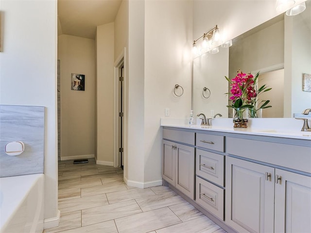 3683 King Arthur Ct, Newcastle, OK 73065 - full bath with double vanity, baseboards, and a bath