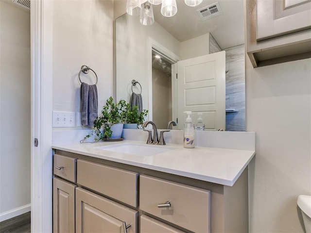 3683 King Arthur Ct, Newcastle, OK 73065 - bathroom featuring vanity, toilet, and baseboards