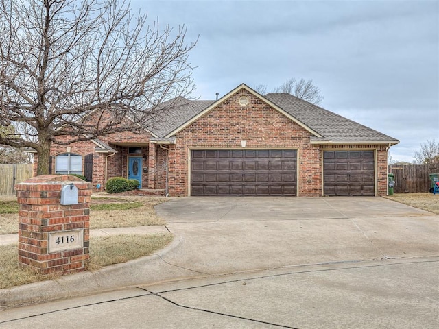 single story home featuring a garage