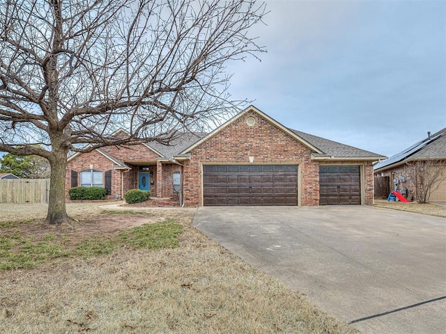 ranch-style house featuring a garage