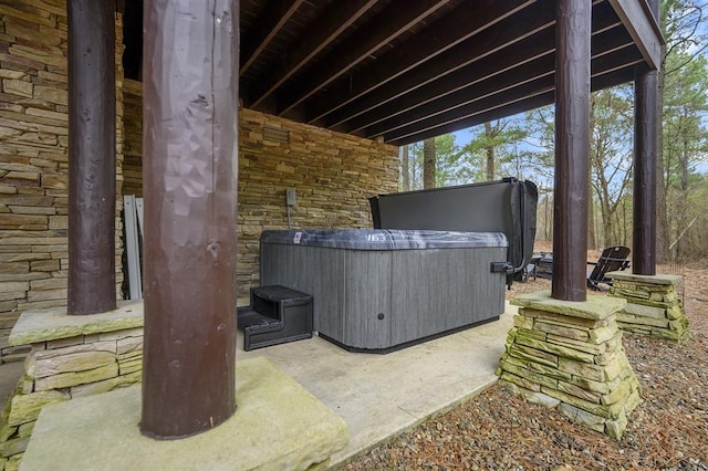 view of patio with a hot tub