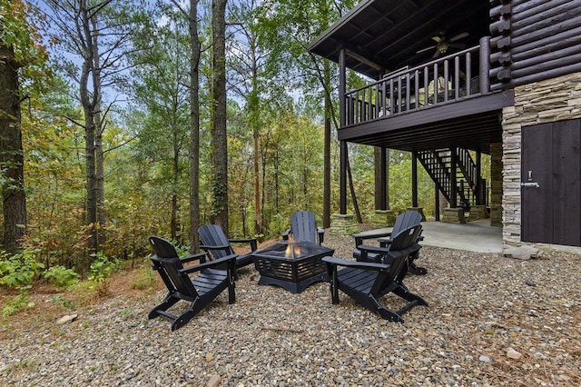 view of yard featuring a patio area and an outdoor fire pit