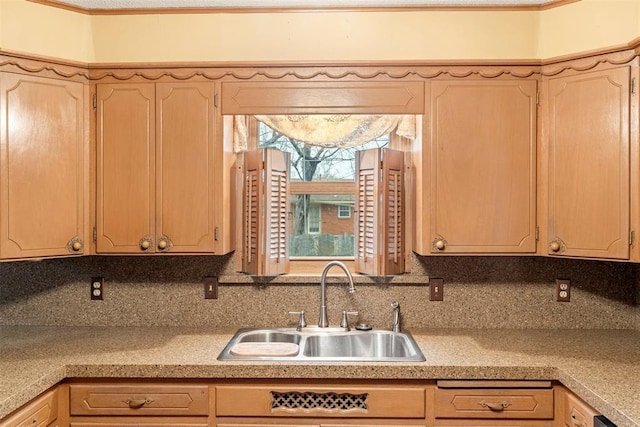 kitchen with sink and light brown cabinets