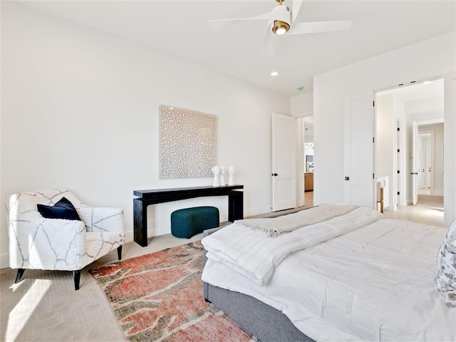 bedroom with baseboards and a ceiling fan