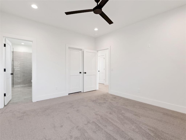 unfurnished bedroom featuring baseboards, carpet flooring, and recessed lighting