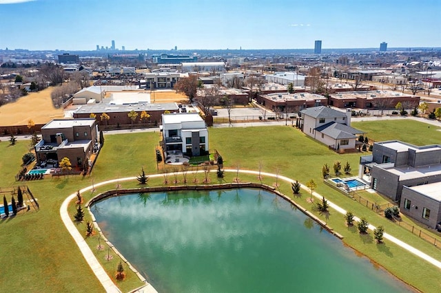 drone / aerial view with a water view and a city view