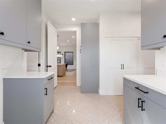810 NW 72nd St, Oklahoma City, OK 73116 - kitchen with gray cabinetry, light countertops, and recessed lighting
