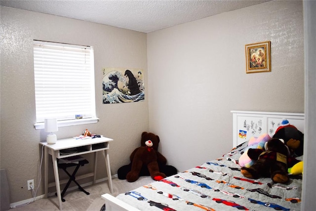 carpeted bedroom with a textured ceiling