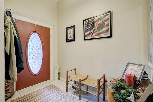 entrance foyer with light tile patterned floors