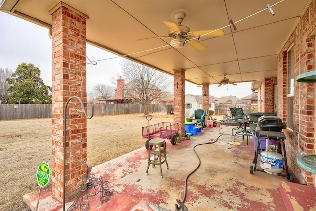 view of patio featuring ceiling fan