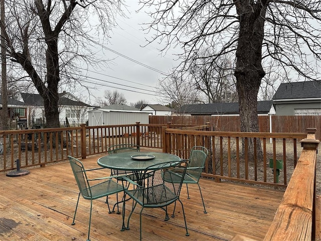 deck featuring a storage shed