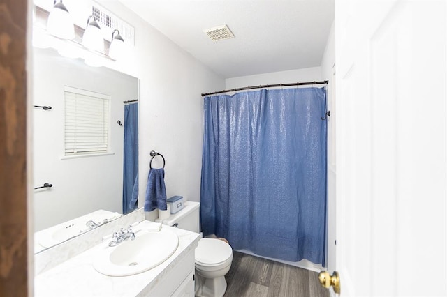 bathroom with vanity, hardwood / wood-style floors, toilet, and a shower with shower curtain