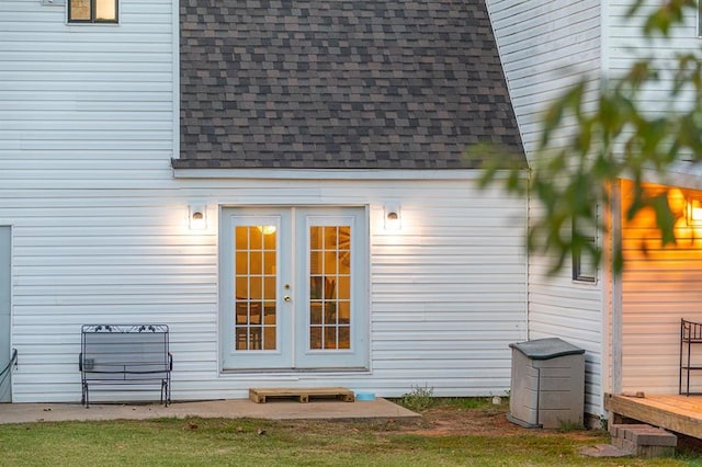 property entrance featuring french doors