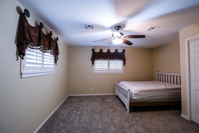 unfurnished bedroom featuring carpet floors and ceiling fan