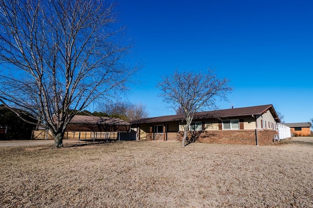 view of front of home with brick siding