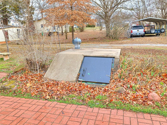 view of entry to storm shelter