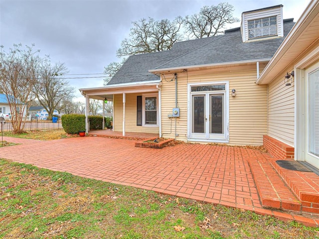 exterior space with french doors and a patio area