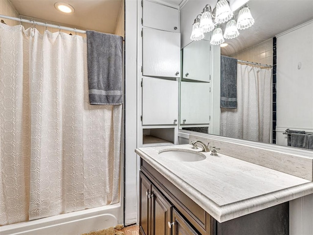 bathroom featuring vanity and shower / tub combo