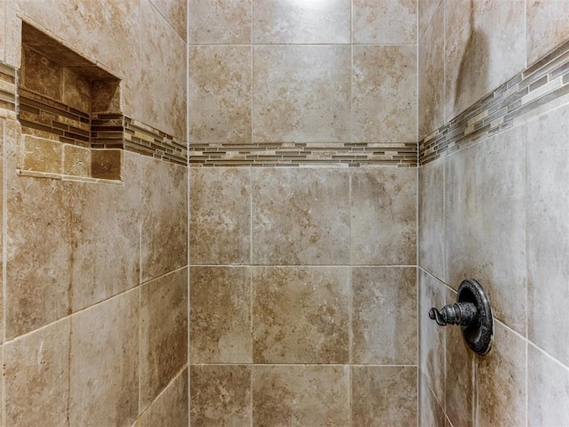 details featuring a tile shower