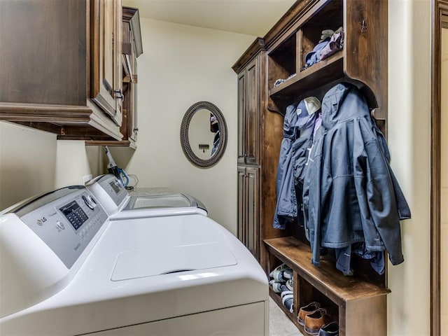 laundry area featuring cabinets and washer and dryer