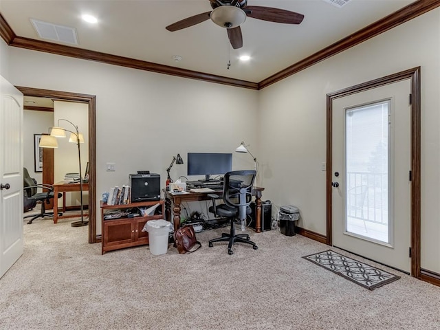 office space with ornamental molding, light carpet, and ceiling fan