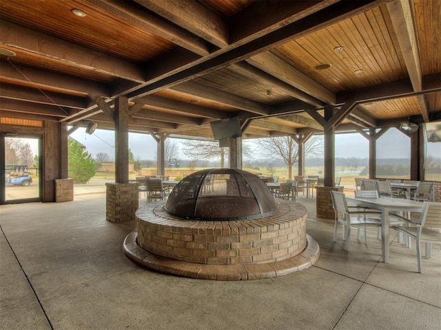 view of patio / terrace with a fire pit