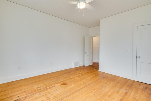 unfurnished room featuring ceiling fan and light hardwood / wood-style floors