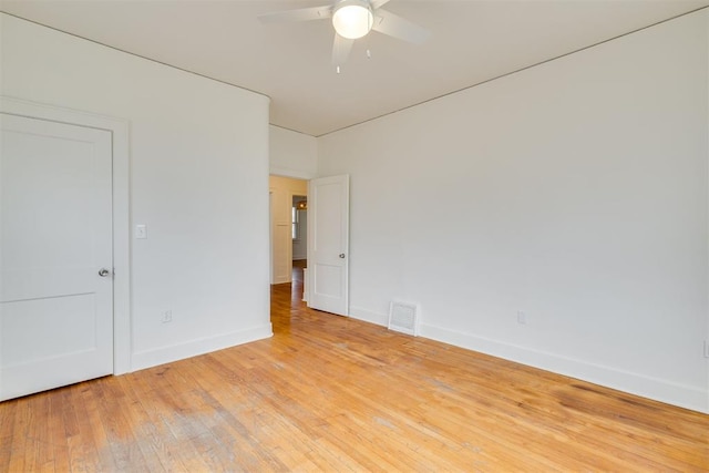 unfurnished room with ceiling fan and light hardwood / wood-style flooring