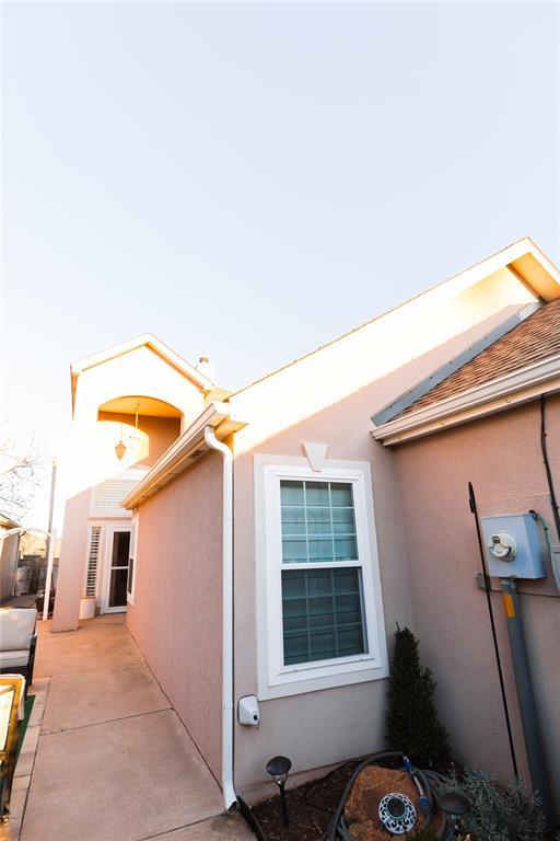 view of property exterior featuring a patio area and stucco siding