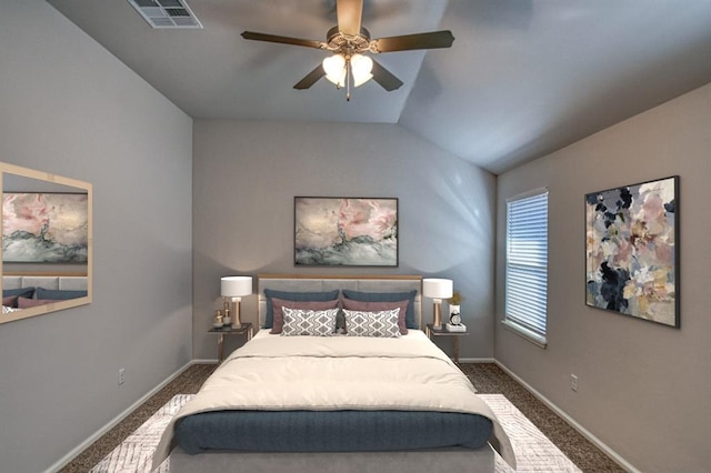 carpeted bedroom with lofted ceiling, baseboards, visible vents, and a ceiling fan