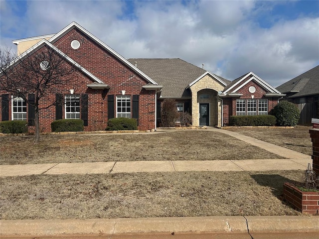 view of front of home with brick siding