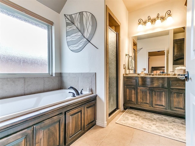 bathroom with vanity, separate shower and tub, and tile patterned flooring