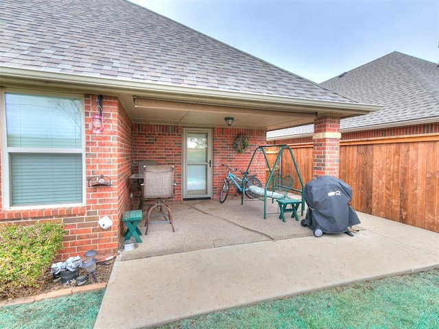 view of patio with a grill