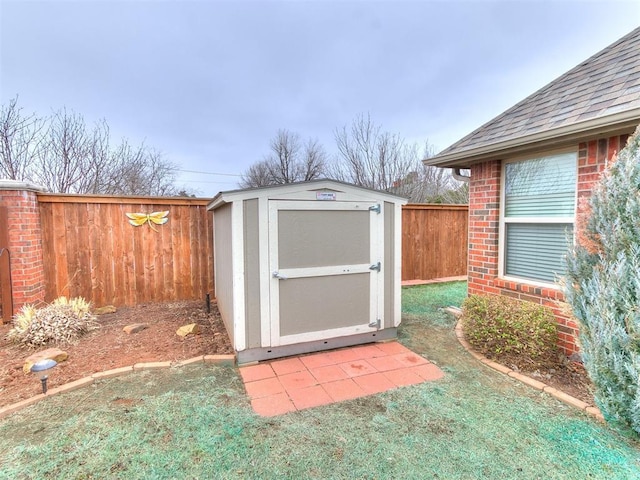 view of outbuilding with a yard