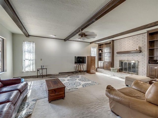 carpeted living room with built in features, a brick fireplace, beamed ceiling, and a textured ceiling