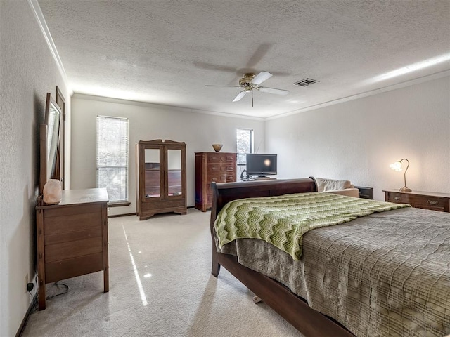 bedroom with light carpet, multiple windows, visible vents, and ornamental molding