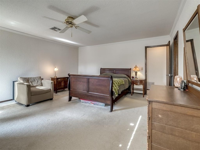 bedroom featuring ornamental molding, visible vents, light carpet, and a textured ceiling